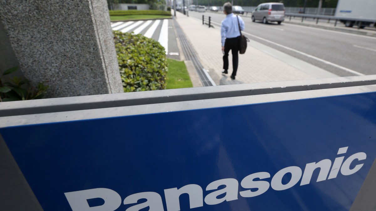 A man walks past Panasonic Corp. signage at the company's headquarters in Kadoma, Osaka Prefecture, Japan, on Wednesday, July 31, 2013. Panasonic, Japan's biggest consumer electronics maker, reported profit that exceeded analyst estimates after cutting wages, selling assets and a one-time gain from changes in pension accounting. Photographer: Tomohiro Ohsumi/Bloomberg A man walks past Panasonic Corp. signage at the company's headquarters in Kadoma, Osaka Prefecture, Japan, on Wednesday, July 31, 2013. Panasonic, Japan's biggest consumer electronics maker, reported profit that exceeded analyst estimates after cutting wages, selling assets and a one-time gain from changes in pension accounting. Photographer: Tomohiro Ohsumi/Bloomberg