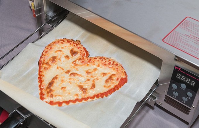 when-its-done-you-pop-it-into-a-400-degree-oven-for-five-minutes--and-voil-time-to-slice-up-your-3d-printed-pizza when-its-done-you-pop-it-into-a-400-degree-oven-for-five-minutes--and-voil-time-to-slice-up-your-3d-printed-pizza