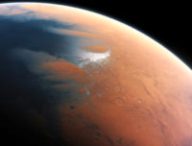 This artist’s impression shows how Mars may have looked about four billion years ago. The young planet Mars would have had enough water to cover its entire surface in a liquid layer about 140 metres deep, but it is more likely that the liquid would have pooled to form an ocean occupying almost half of Mars’s northern hemisphere, and in some regions reaching depths greater than 1.6 kilometres.