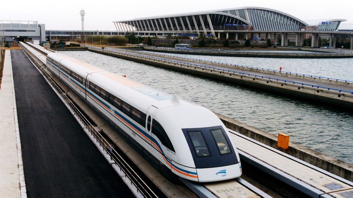 a_maglev_train_coming_out_pudong_international_airport_shanghai a_maglev_train_coming_out_pudong_international_airport_shanghai