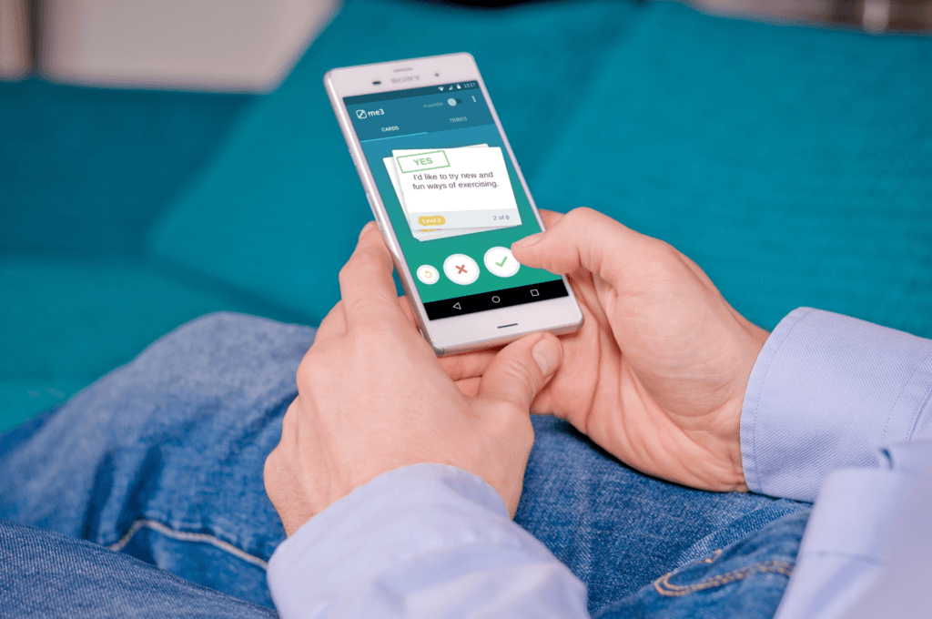 swiping-cards-male-on-couch swiping-cards-male-on-couch