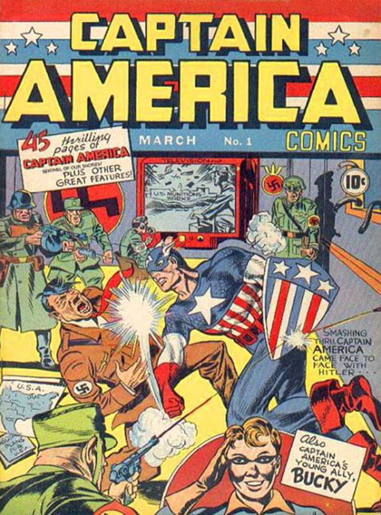 Couverture du tout premier numéro des aventures de Captain America, qui commence donc sa carrière par une petite droite à Hitler. Couverture du tout premier numéro des aventures de Captain America, qui commence donc sa carrière par une petite droite à Hitler.