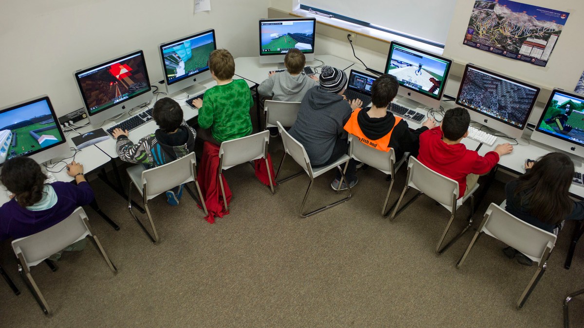 Sixth-graders at Dzantik'i Heeni Middle School work on the Mindcraft mazes during their technology class in Juneau, Alaska, on Friday, March 6, 2015. Rather than fight the electronic glue, some educators are embracing children tech-obsession and finding ways to incorporate computer games into the classroom. None has been more popular than Minecraft. (AP Photo/The Juneau Empire, Michael Penn ) Sixth-graders at Dzantik'i Heeni Middle School work on the Mindcraft mazes during their technology class in Juneau, Alaska, on Friday, March 6, 2015. Rather than fight the electronic glue, some educators are embracing children tech-obsession and finding ways to incorporate computer games into the classroom. None has been more popular than Minecraft. (AP Photo/The Juneau Empire, Michael Penn )