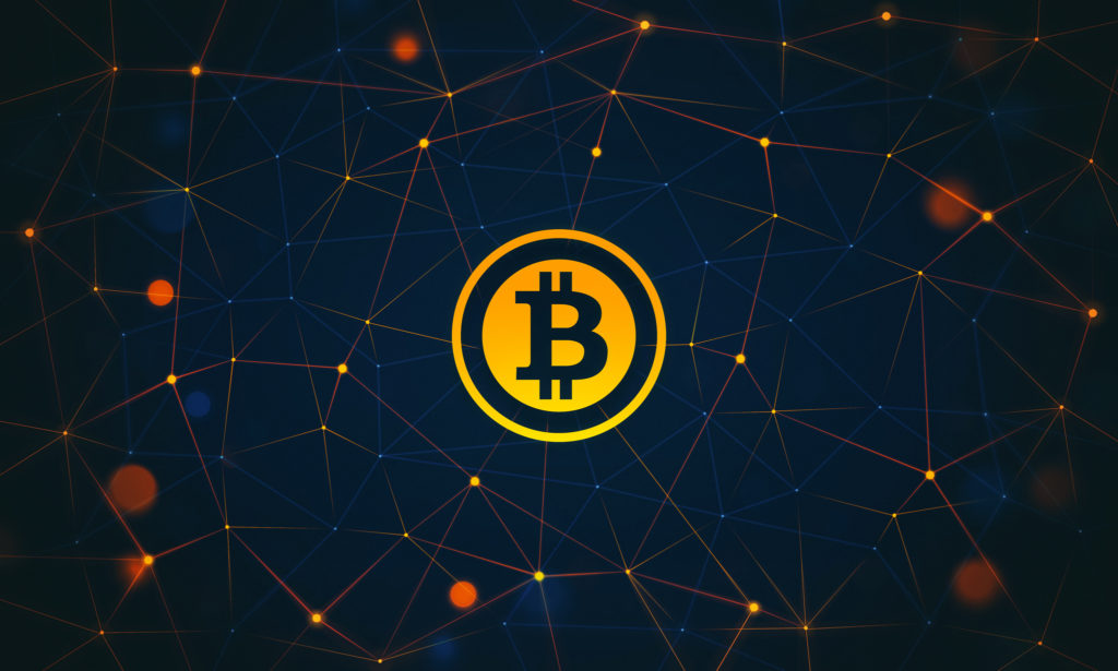 Le symbole du Bitcoin. // Source : Jason Benjamin Le symbole du Bitcoin. // Source : Jason Benjamin
