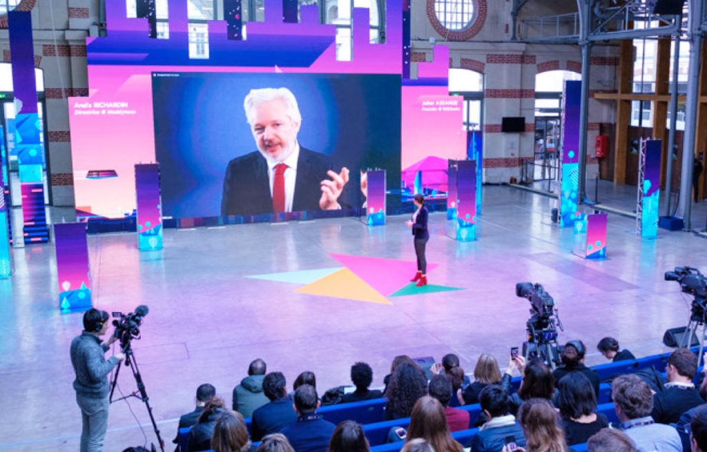 L'an dernier, l'événement accueillait une visioconférence de Julian Assange. // Source : Maddy L'an dernier, l'événement accueillait une visioconférence de Julian Assange. // Source : Maddy