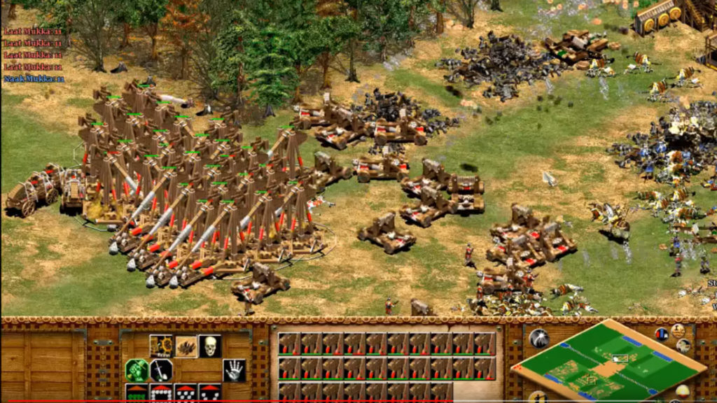 Capture d'écran d'une partie d'Age of Empire, avec des trébuchets. // Source : Capture d'écran YouTube / Gaming Cons Capture d'écran d'une partie d'Age of Empire, avec des trébuchets. // Source : Capture d'écran YouTube / Gaming Cons