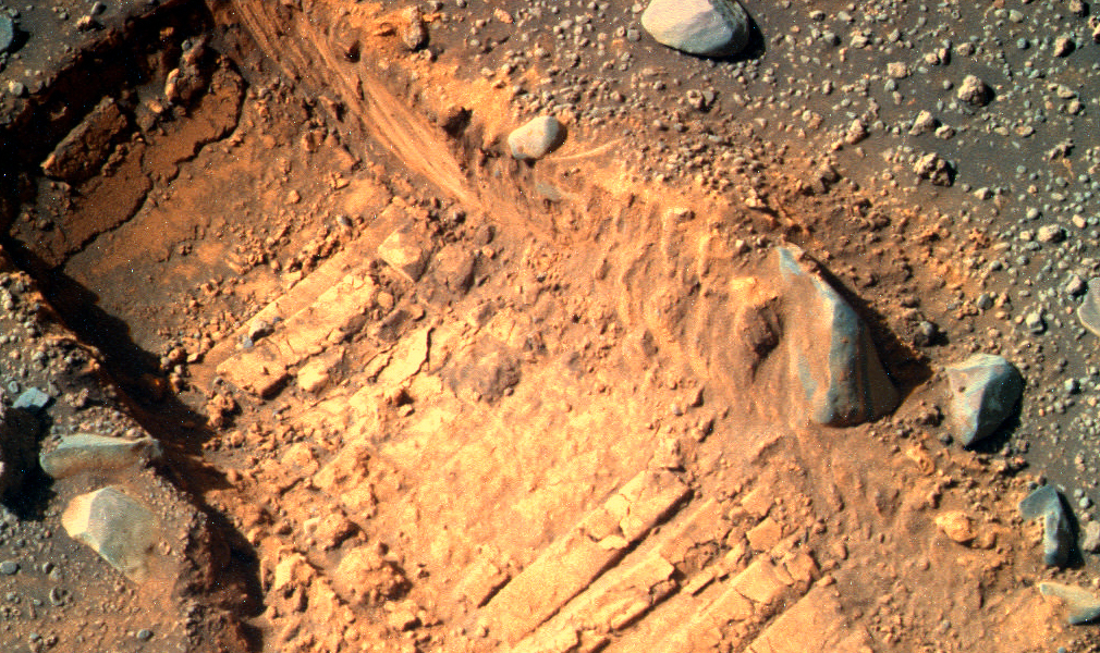 Des traces laissées par Opportunity. // Source : Flickr/CC/Kevin Gill (photo recadrée) Des traces laissées par Opportunity. // Source : Flickr/CC/Kevin Gill (photo recadrée)