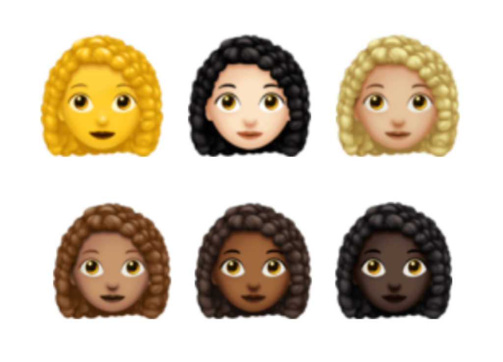 Les emojis cheveux frisés. // Source : Emojipedia Les emojis cheveux frisés. // Source : Emojipedia