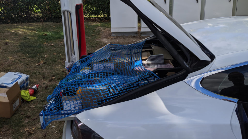 Les techniciens mobiles de Tesla // Source : Numerama