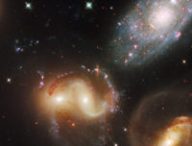 Un groupe de galaxies. // Source : Good Free Photos (photo recadrée)