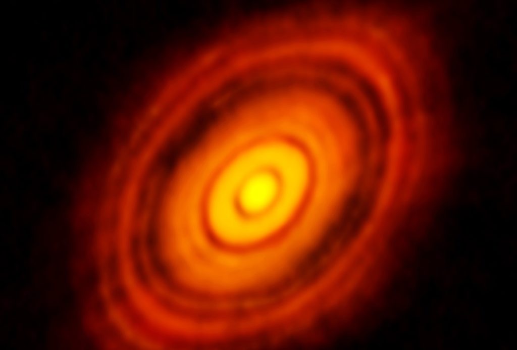 Image du disque protoplanétaire de HL Tauri réalisée par l'Atacama Large Millimeter Array. // Source : ALMA Image du disque protoplanétaire de HL Tauri réalisée par l'Atacama Large Millimeter Array. // Source : ALMA