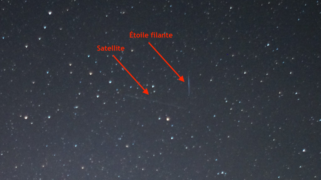 Une étoile filante et un satellite. // Source : Flickr/CC/Mike Lewinski (photo recadrée et annotée) Une étoile filante et un satellite. // Source : Flickr/CC/Mike Lewinski (photo recadrée et annotée)