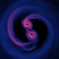 Deux trous noirs en orbite l'un autour de l'autre. // Source : Flickr/CC/NASA’s Goddard Space Flight Center Deux trous noirs en orbite l'un autour de l'autre. // Source : Flickr/CC/NASA’s Goddard Space Flight Center