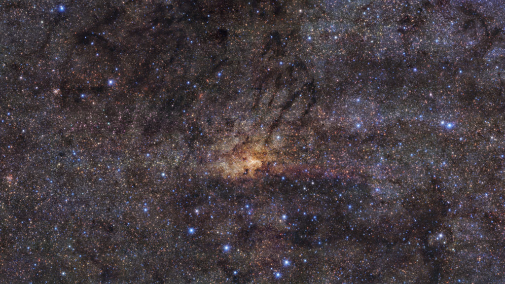 La région centrale de la Voie lactée. // Source : ESO/Nogueras-Lara et al. (photo recadrée) La région centrale de la Voie lactée. // Source : ESO/Nogueras-Lara et al. (photo recadrée)