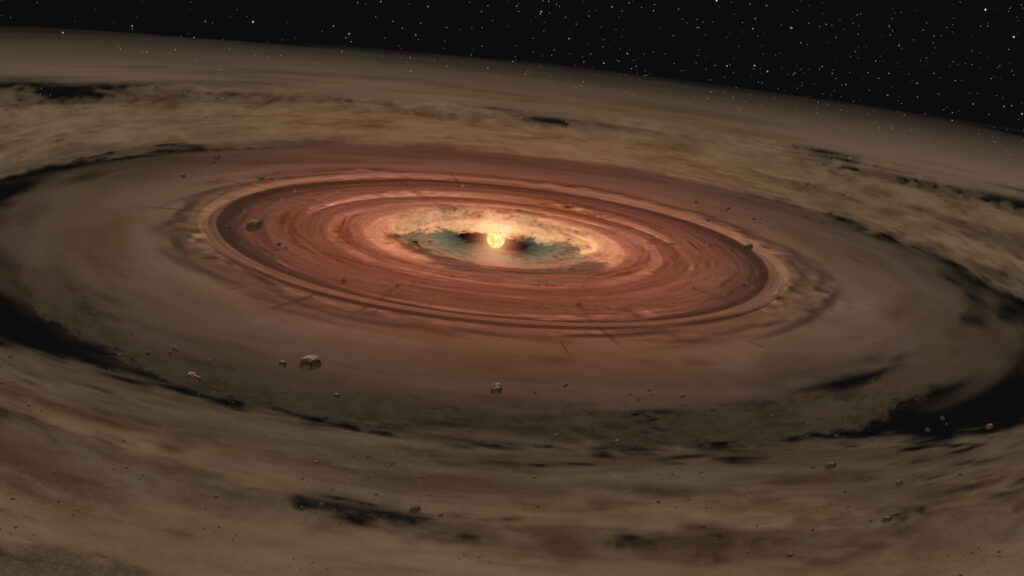 Une jeune étoile entourée d'un disque de gaz et de poussières. // Source : NASA/JPL-Caltech (photo recadrée) Une jeune étoile entourée d'un disque de gaz et de poussières. // Source : NASA/JPL-Caltech (photo recadrée)