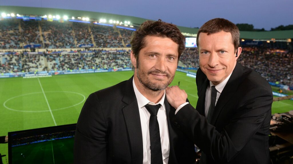Grégoire Margotton et Bixente Lizarazu, commentateurs sur TF1 // Source : Twitter TF1 Grégoire Margotton et Bixente Lizarazu, commentateurs sur TF1 // Source : Twitter TF1