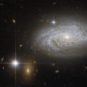 La galaxie NGC 3021 contient des céphéides, utiles pour estimer des mesures de distance. // Source : NASA & ESA (photo recadrée) La galaxie NGC 3021 contient des céphéides, utiles pour estimer des mesures de distance. // Source : NASA & ESA (photo recadrée)