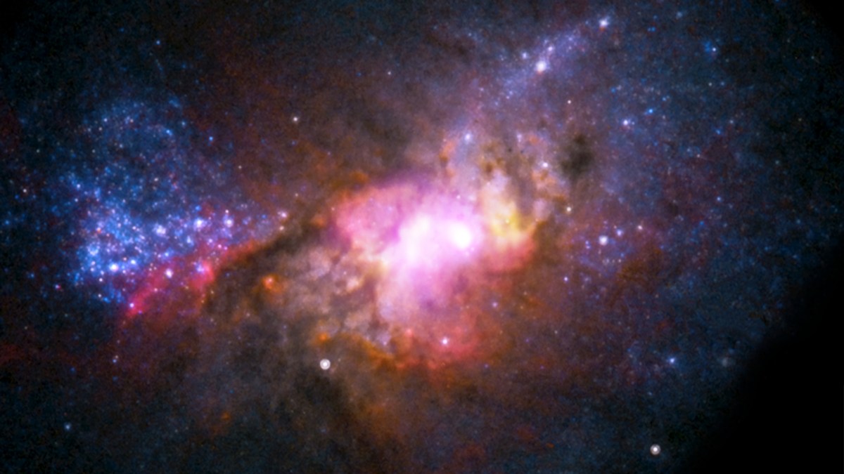 Vue d'un trou noir et sa galaxie. // Source : Flickr/CC/NASA/CXC (photo recadrée) Vue d'un trou noir et sa galaxie. // Source : Flickr/CC/NASA/CXC (photo recadrée)