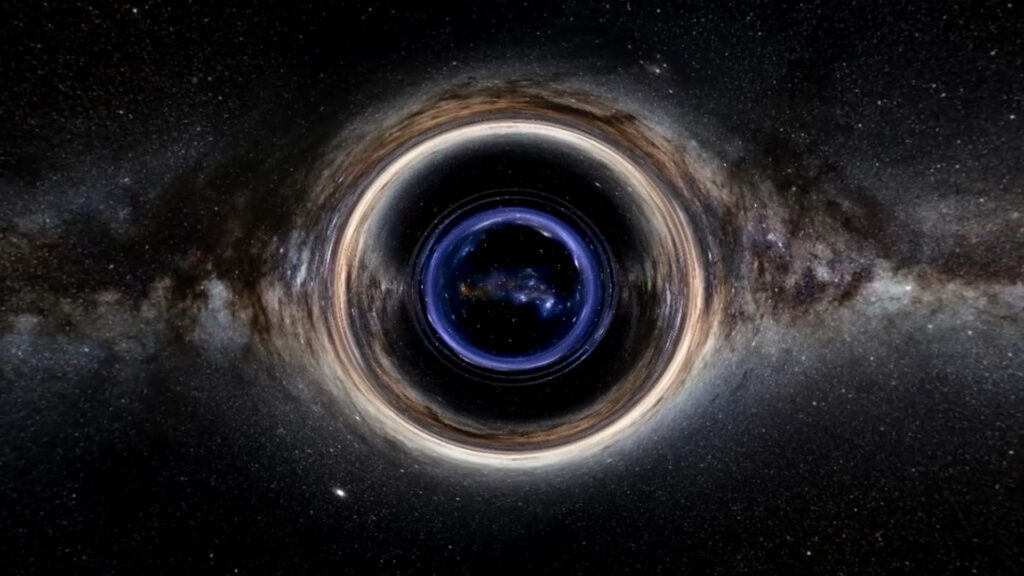 Simulation d'un trou de ver. // Source : Capture d'écran YouTube Pierre-Jean Charpin Simulation d'un trou de ver. // Source : Capture d'écran YouTube Pierre-Jean Charpin