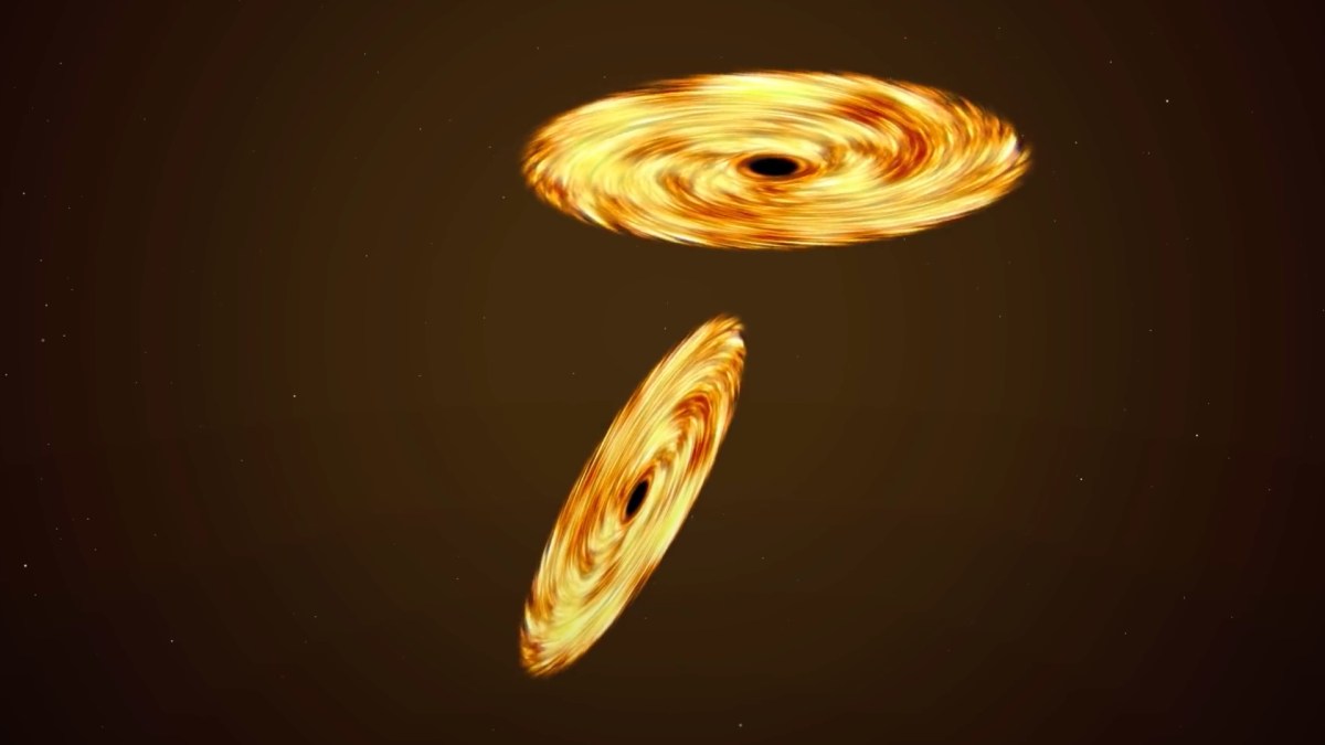 Deux trous noirs. // Source : Capture d'écran YouTube What If Deux trous noirs. // Source : Capture d'écran YouTube What If