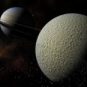 Vue d'artiste de Rhéa et Saturne. // Source : Flickr/CC/Kevin Gill Vue d'artiste de Rhéa et Saturne. // Source : Flickr/CC/Kevin Gill