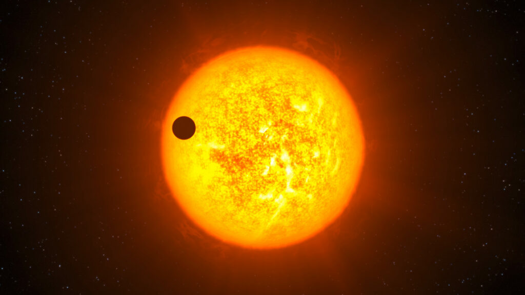 Vue d'artiste d'une exoplanète en transit devant son étoile. // Source : Wikimedia/CC/ESO/L. Calçada (image recadrée) Vue d'artiste d'une exoplanète en transit devant son étoile. // Source : Wikimedia/CC/ESO/L. Calçada (image recadrée)