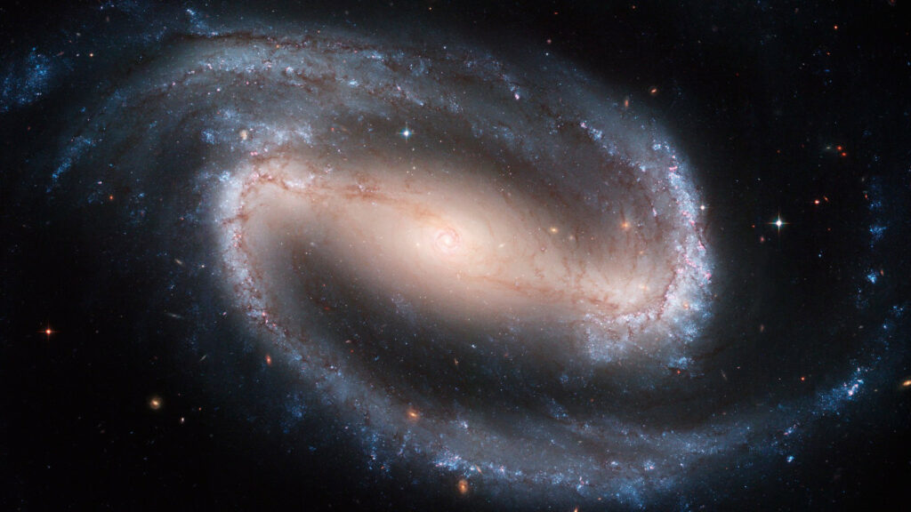 NGC 1300, un exemple de galaxie spirale barrée. // Source : Flickr/CC/NASA, ESA, and The Hubble Heritage Team (STScI/AURA) (image recadrée) NGC 1300, un exemple de galaxie spirale barrée. // Source : Flickr/CC/NASA, ESA, and The Hubble Heritage Team (STScI/AURA) (image recadrée)