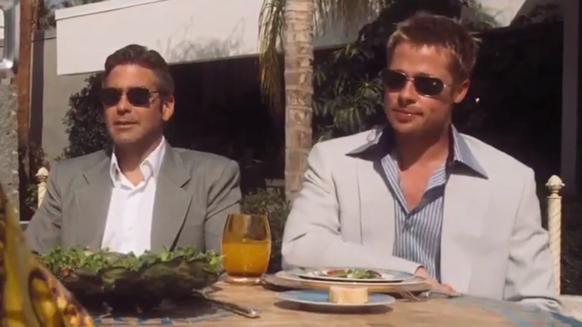 George Clooney et Brad Pitt dans Ocean's Eleven // Source : Warner Bros George Clooney et Brad Pitt dans Ocean's Eleven // Source : Warner Bros