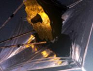 Vue d'artiste du JWST. // Source : Flickr/CC/Adriana Manrique Gutierrez, NASA Animator (photo recadrée et inclinée) Vue d'artiste du JWST. // Source : Flickr/CC/Adriana Manrique Gutierrez, NASA Animator (photo recadrée et inclinée)