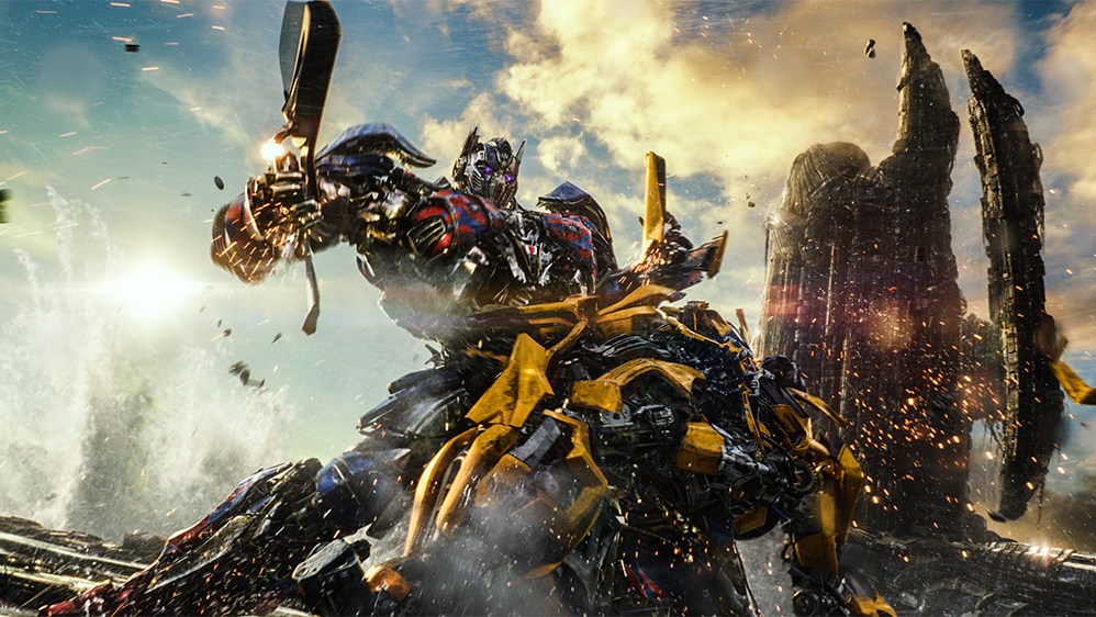 Left to right: Optimus Prime and Bumblebee in TRANSFORMERS: THE LAST KNIGHT, from Paramount Pictures.