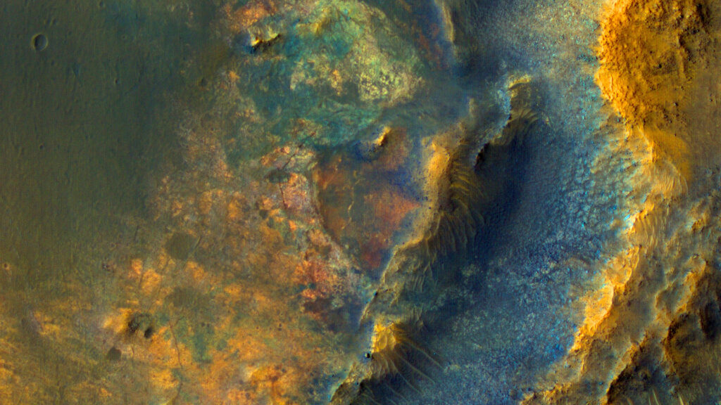 Une région aux textures variées sur Mars. // Source : NASA/JPL/UArizona (recadré) Une région aux textures variées sur Mars. // Source : NASA/JPL/UArizona (recadré)