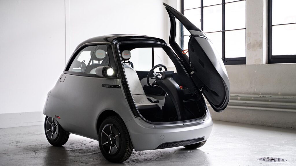Microlino avec sa porte unique // Source : Micro Microlino avec sa porte unique // Source : Micro