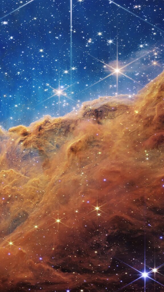 Un morceau de la nébuleuse de la Carène // Source : Nasa // Montage de Sophie Aubé pour Numerama Un morceau de la nébuleuse de la Carène // Source : Nasa // Montage de Sophie Aubé pour Numerama