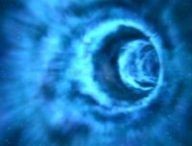À quoi pourrait bien ressembler un trou de ver, si cela existe ? // Source : Stargate À quoi pourrait bien ressembler un trou de ver, si cela existe ? // Source : Stargate