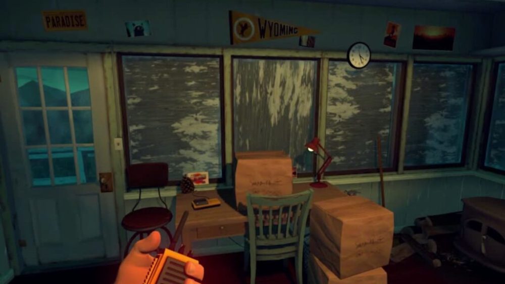 Firewatch, image en jeu d'un bureau avec des cartons // Source : Nintendo