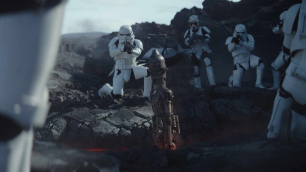 IG-11 se sacrifie pour que les autres puissent survivre // Source : Disney+ IG-11 se sacrifie pour que les autres puissent survivre // Source : Disney+