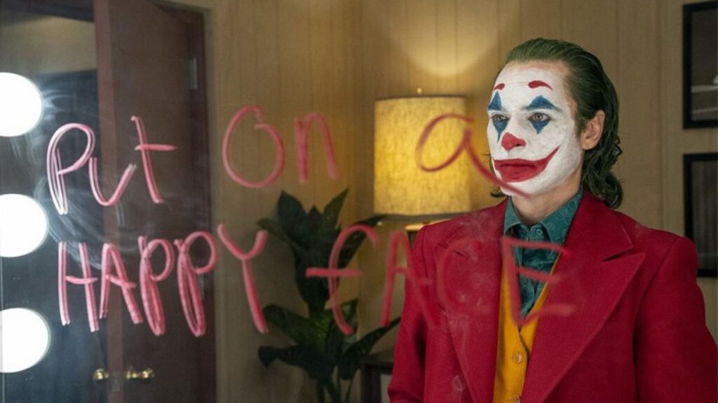 Le film Joker avec Joaquin Phoenix jouait justement sur le contraste de la « happy face ». // Source : DC/Warner Le film Joker avec Joaquin Phoenix jouait justement sur le contraste de la « happy face ». // Source : DC/Warner
