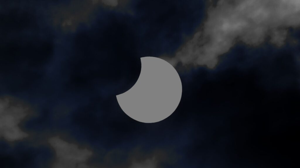Éclipse solaire, phase partielle. // Source : Canva Éclipse solaire, phase partielle. // Source : Canva