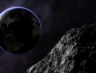 Un astéroïde et la Terre. // Source : Canva