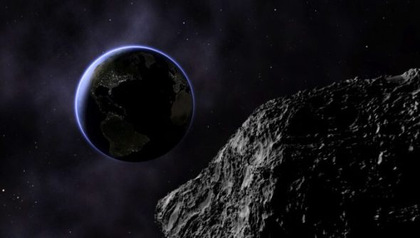 Un astéroïde et la Terre. // Source : Canva Un astéroïde et la Terre. // Source : Canva