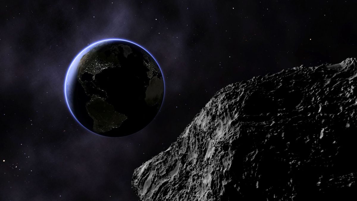 Un astéroïde et la Terre. // Source : Canva Un astéroïde et la Terre. // Source : Canva