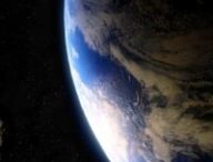 Un astéroïde et la Terre. // Source : Canva Un astéroïde et la Terre. // Source : Canva