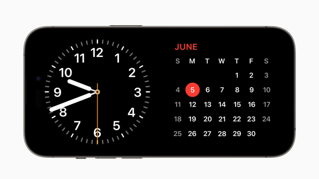 Fonction StandBy pour iPhone avec iOS 17 // Source : Apple Fonction StandBy pour iPhone avec iOS 17 // Source : Apple