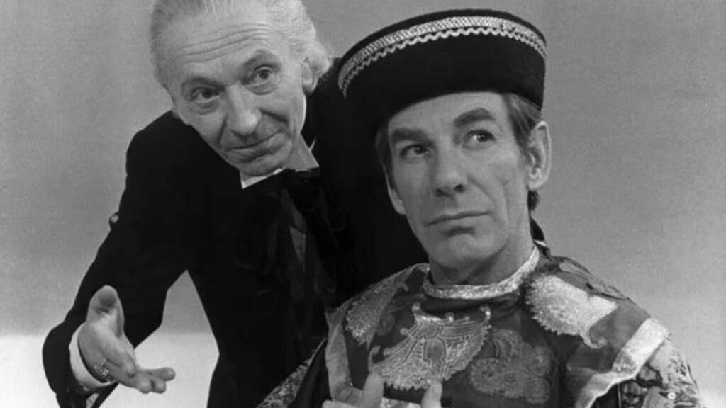 Le Premier Docteur, à côté du Toymaker, dans les épisodes de 1966 de Doctor Who. // Source : BBC Le Premier Docteur, à côté du Toymaker, dans les épisodes de 1966 de Doctor Who. // Source : BBC