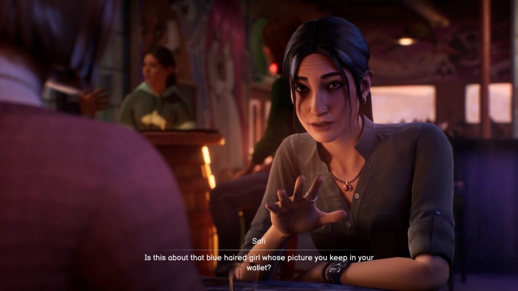 Safi faisant référence à Chloe dans Life is Strange : Double Exposure. // Source : Deck Nine / Square Enix Safi faisant référence à Chloe dans Life is Strange : Double Exposure. // Source : Deck Nine / Square Enix