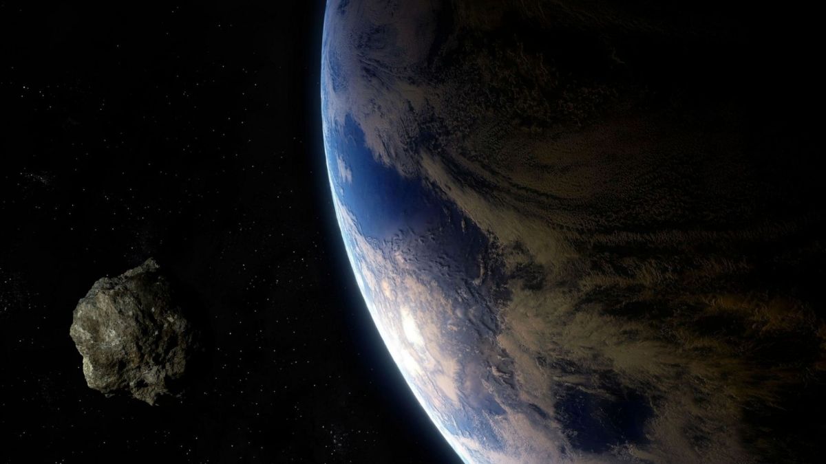Un astéroïde et la Terre. // Source : Canva Un astéroïde et la Terre. // Source : Canva