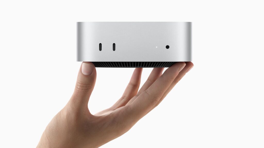 Le Mac mini dans une main. // Source : Apple Le Mac mini dans une main. // Source : Apple