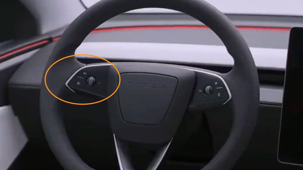 Retour du commodo de clignotant dans le Tesla Model Y de 2025 // Source : Tesla Retour du commodo de clignotant dans le Tesla Model Y de 2025 // Source : Tesla