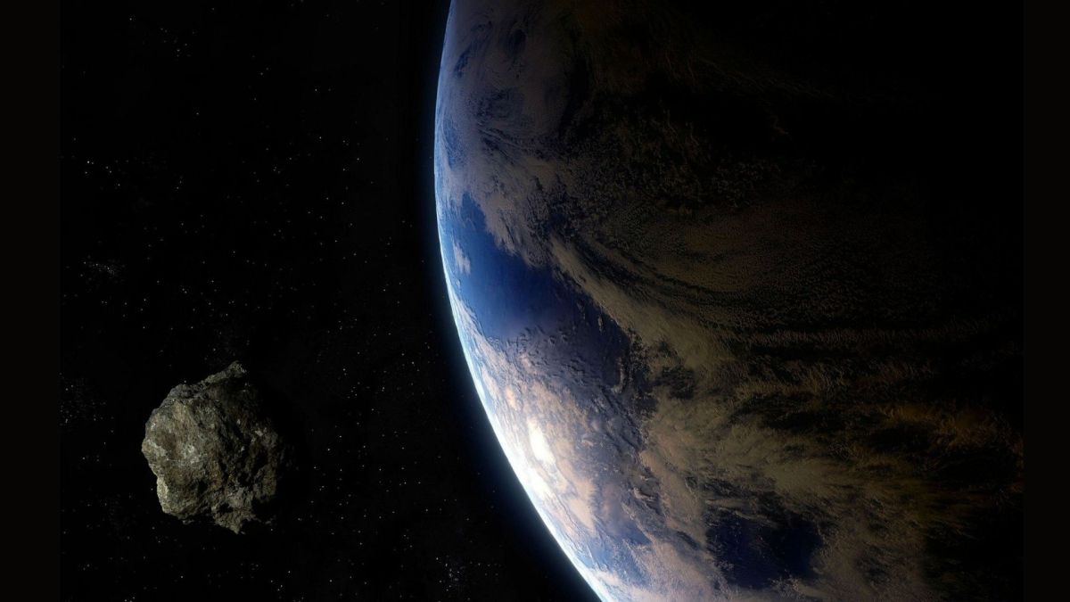 Un astéroïde et la Terre. // Source : Pixabay