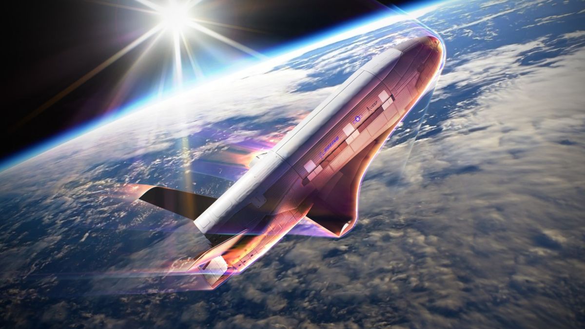 Vue d'artiste du X-37B manœuvrant dans l'espace. // Source : Boeing Space Vue d'artiste du X-37B manœuvrant dans l'espace. // Source : Boeing Space